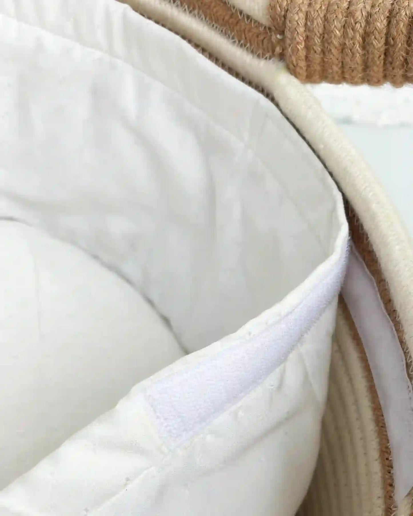 Minimal and stylish baby changing bed with soft cushioning, and secure handles for easy use