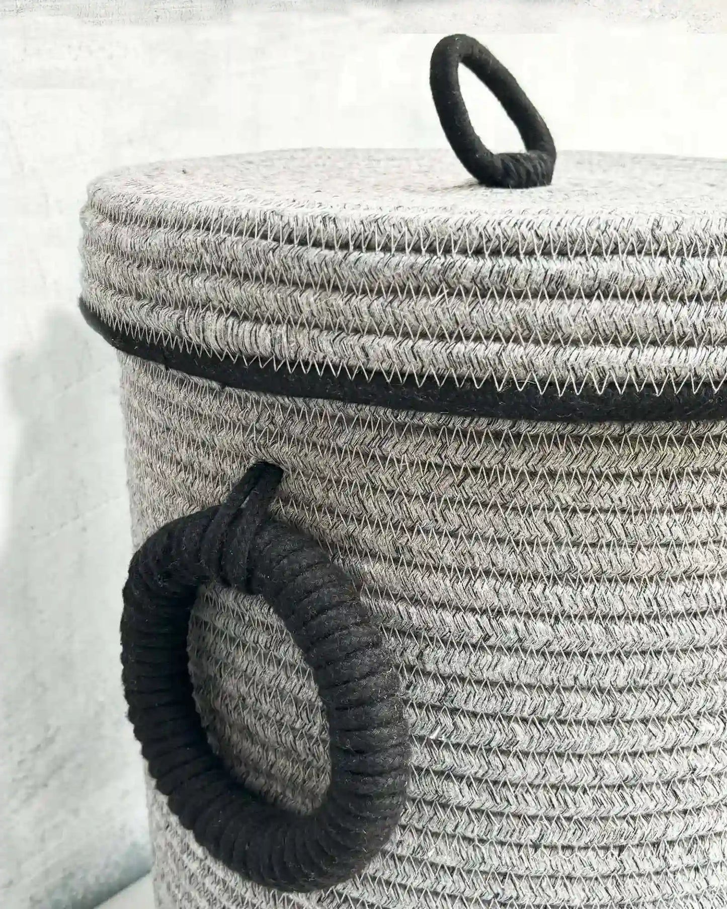 Grey Laundry basket with black round handcrafted handles