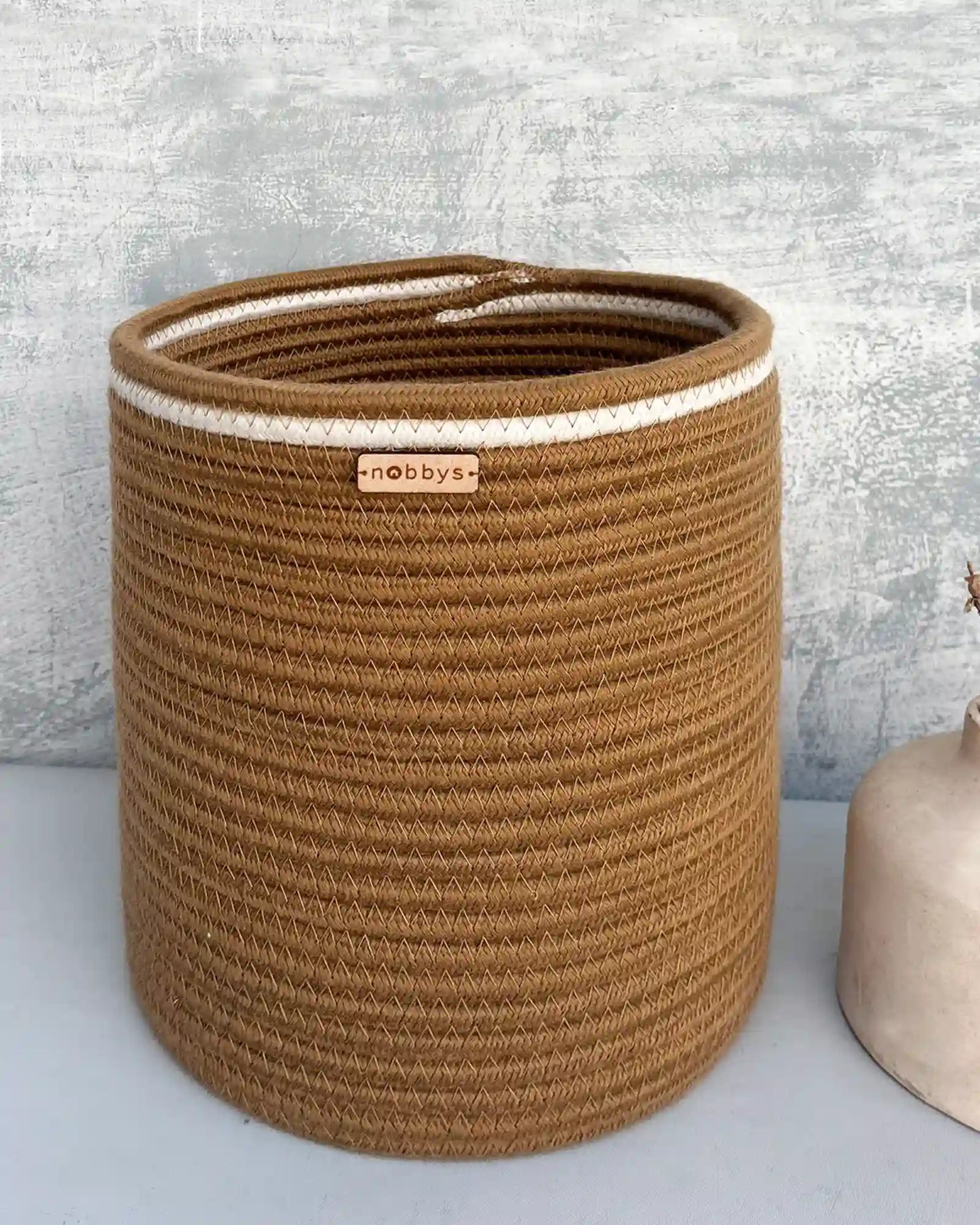 Brown storage basket for toys and clothes