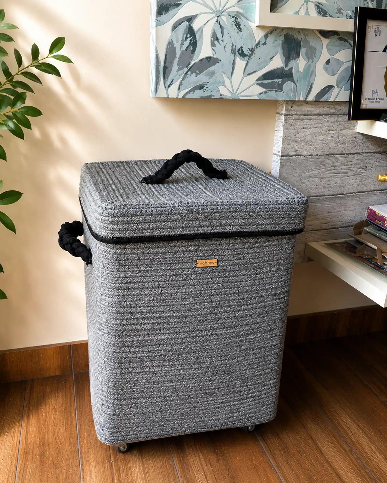 Grey Laundry basket with wheels