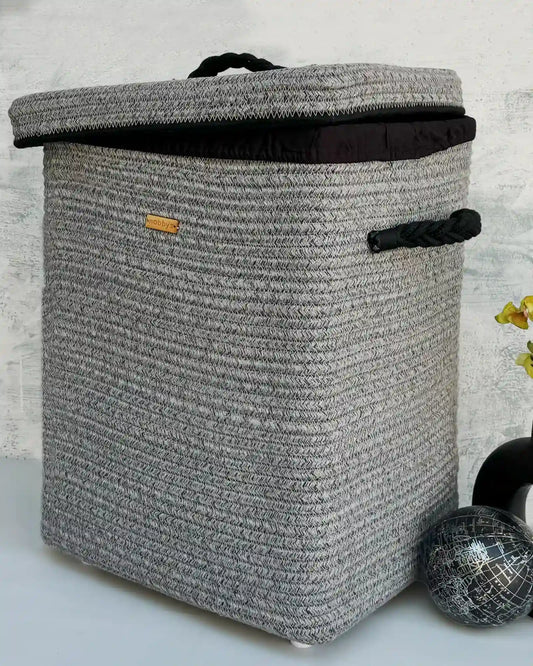 Silver grey rectangular laundry basket with lid – stylish and sturdy home organizer.