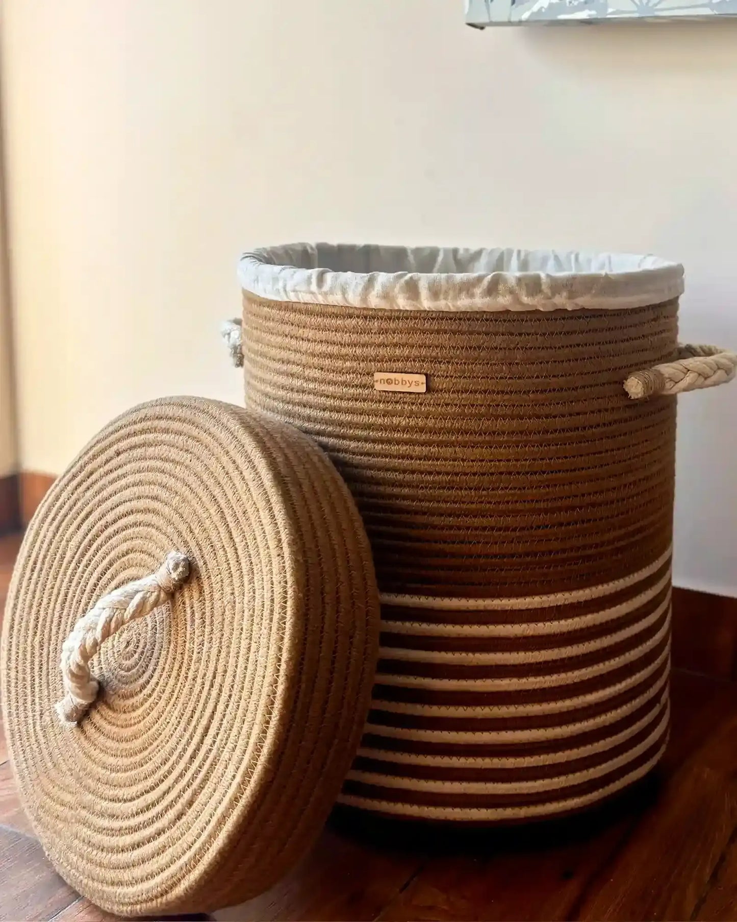 Woven laundry basket with handles, lid and wheels