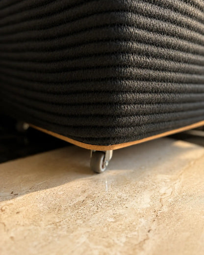 wheels on the black laundry basket