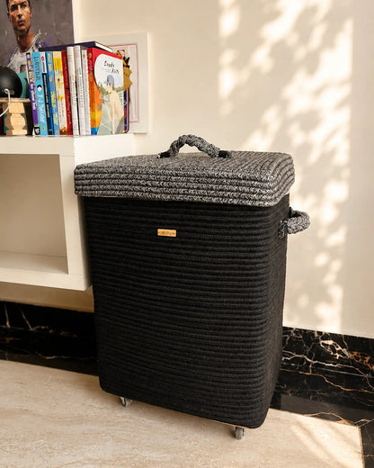 black laundry basket giving elegant look to the interiors