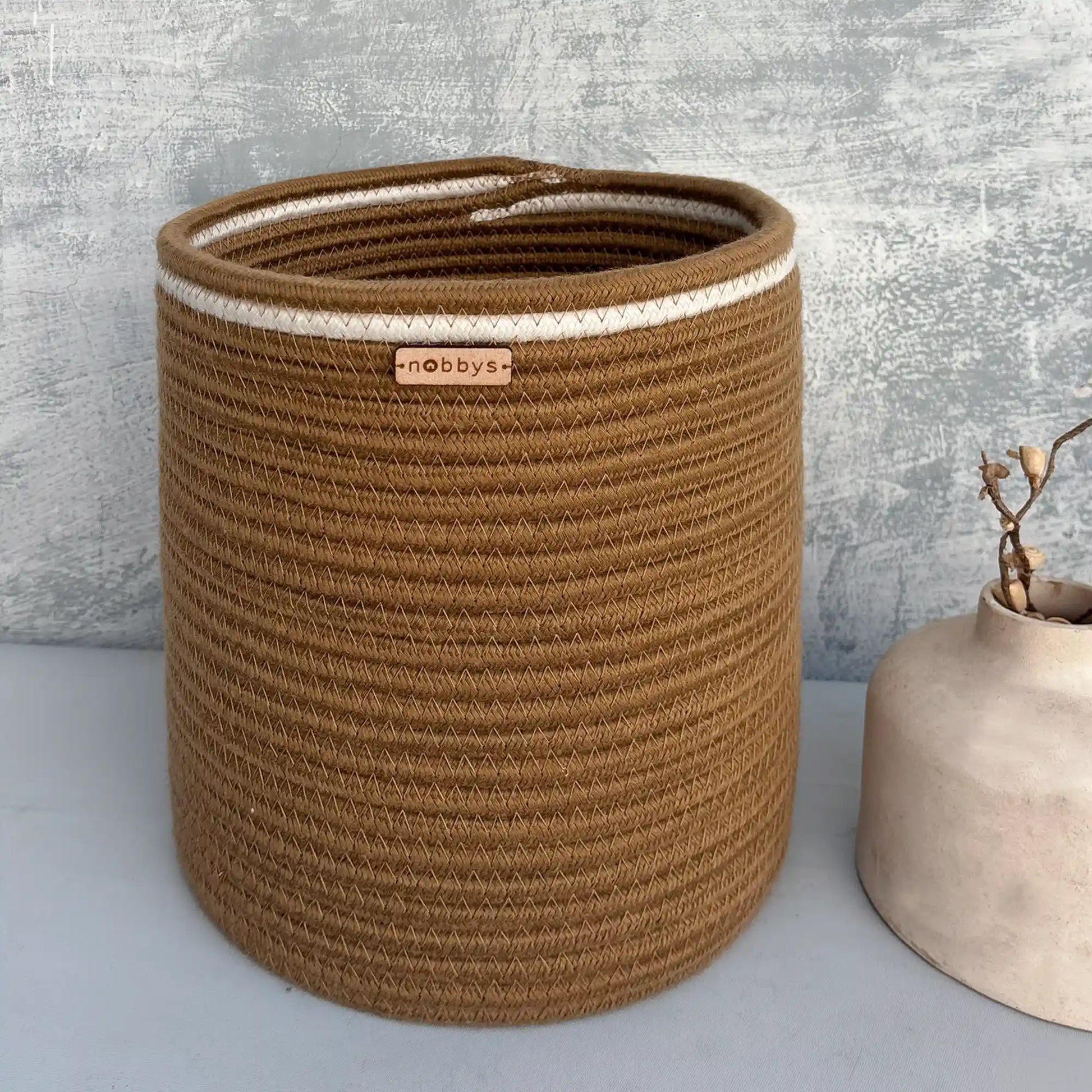 Brown storage basket for toys and clothes